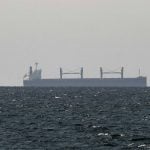 A cargo ship in the Gulf, near the Strait of Hormuz, as seen from northern Ras al-Khaimah, near the border with Oman’s Musandam governance, amid the U.S.-Israeli conflict with Iran, in United Arab Emirates, March 11, 2026.
