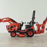 Kioti CS2230 ROPS sub-compact tractor with front loader and backhoe.