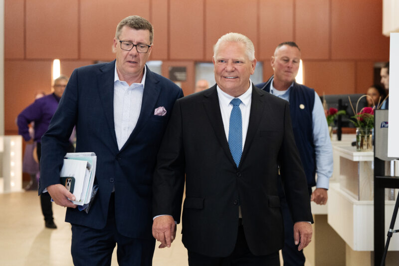 Ontario Premier Doug Ford, centre, and Saskatchewan Premier Scott Moe leave a meeting with Indigenous leaders at the Council of the Federation meeting in Charlottetown on Tuesday, July 21, 2026. THE CANADIAN PRESS/Darren Calabrese